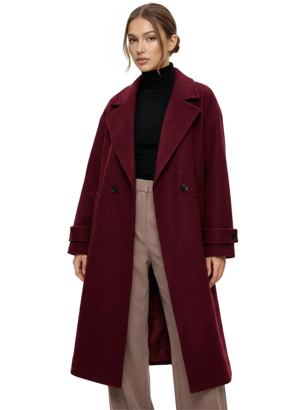 Woman wearing a long wine red oversized double breasted coat with pockets and turn down collar on a white background.