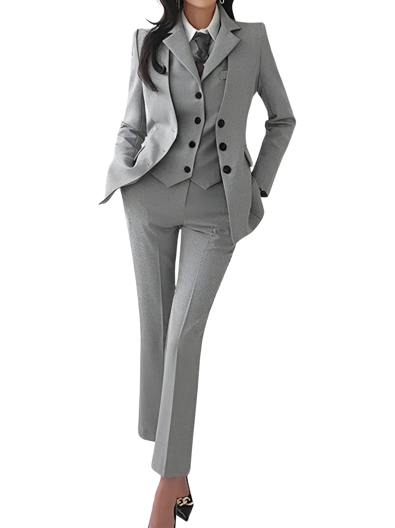woman wearing gray suit with jacket, vest, and pants on a white background