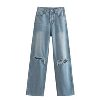 Thumbnail for Light blue distressed jeans on a white background