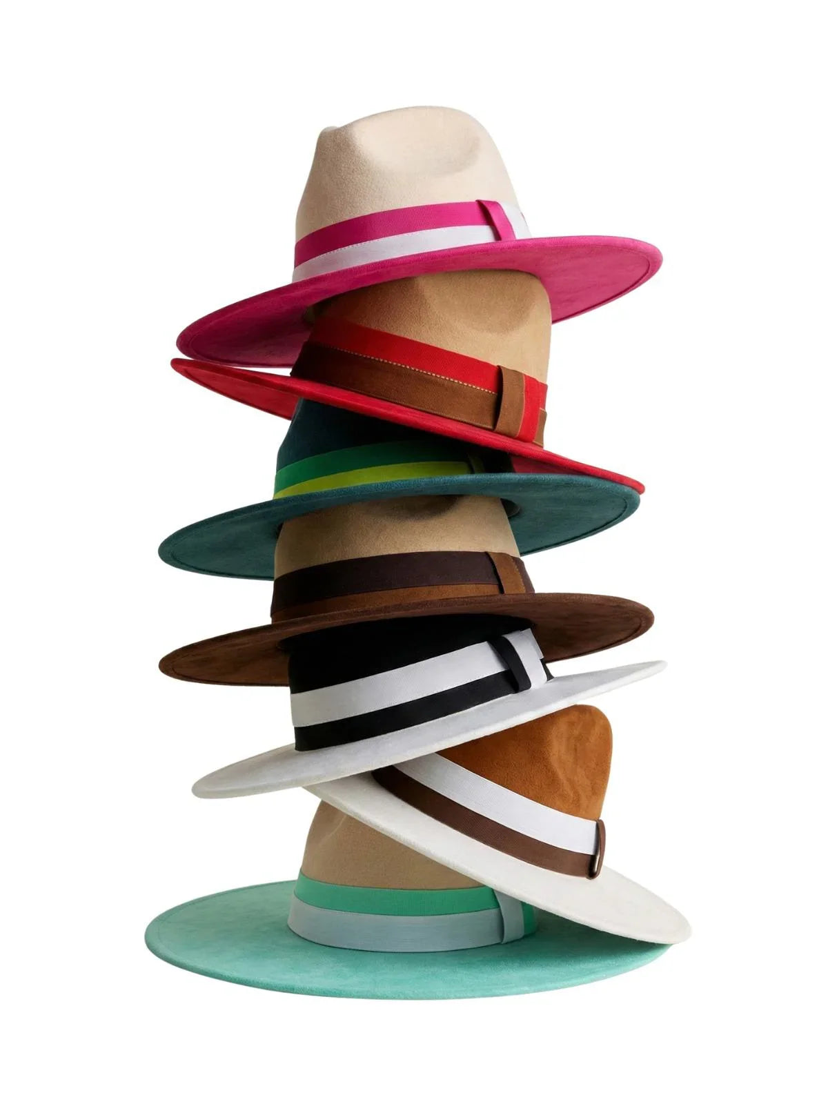 Stack of colorful fedora hats with various band colors on a white background