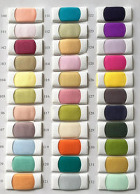 Thumbnail for Color swatch chart with various fabric colors on a gray background