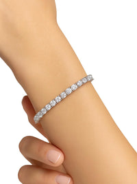 Thumbnail for Diamond tennis bracelet on a person's wrist against a white background