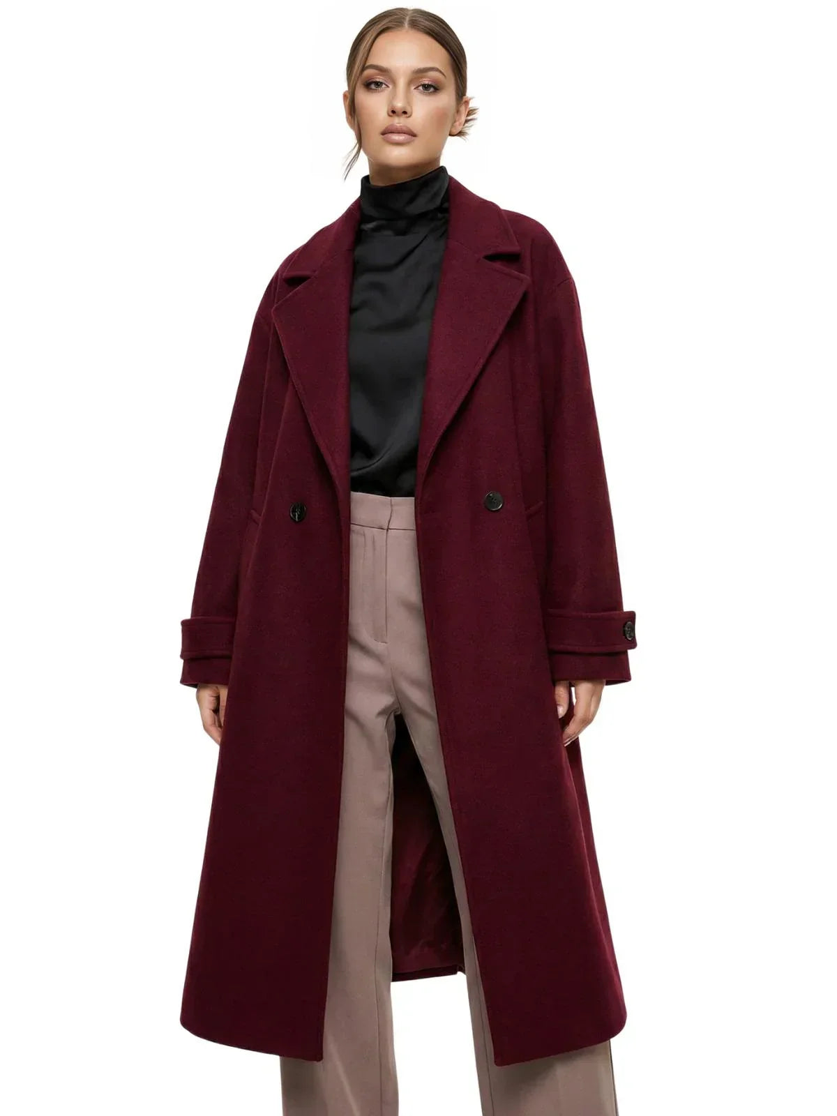 Woman wearing a long wine red oversized double breasted coat with pockets and turn down collar on a white background.