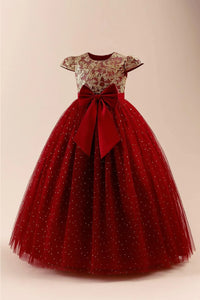 Thumbnail for Red dress with floral top and large bow on a beige background