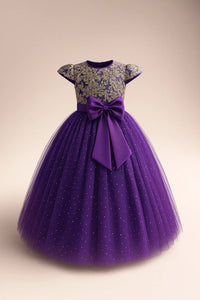 Thumbnail for Purple dress with floral top and large bow on a beige background