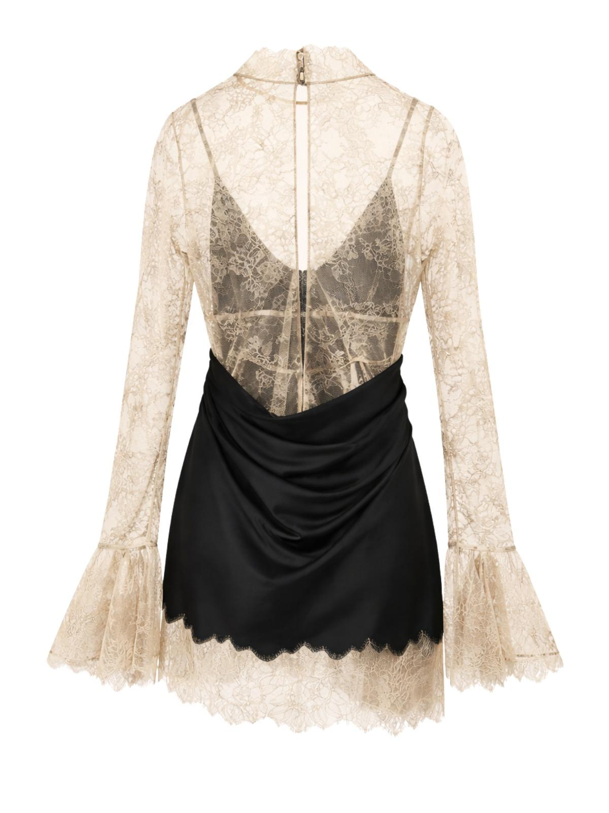 Black mini dress with beige lace long sleeves on a white background