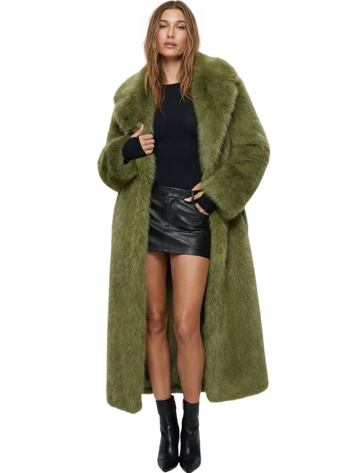 Woman wearing a long green fur coat on a white background