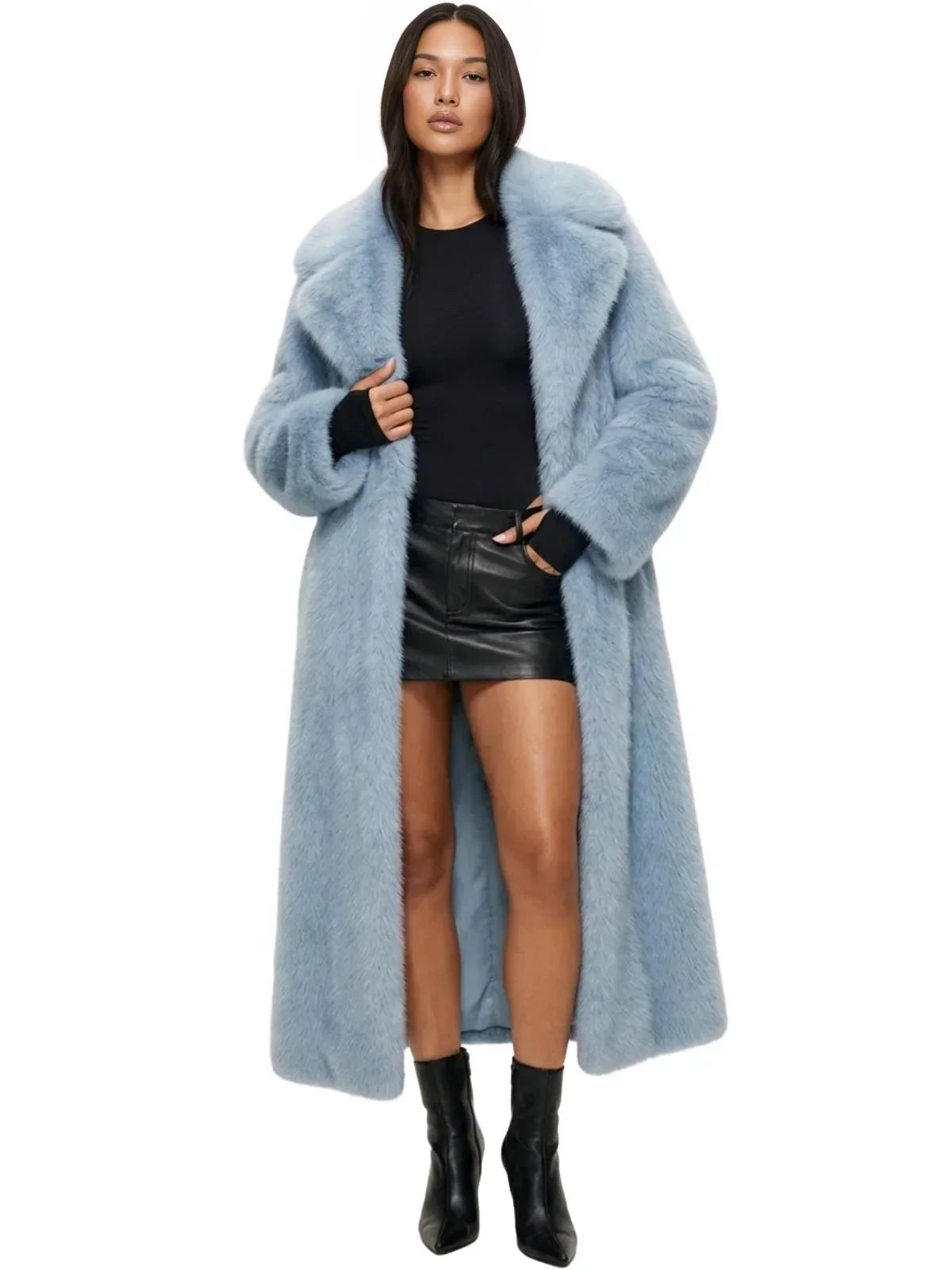 Woman wearing a long light blue fur coat on a white background