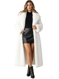 Thumbnail for Woman wearing a long white fur coat, black top, and leather skirt on a white background
