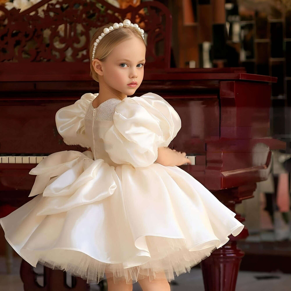Shop Dresses for Kids at Drestiny for this stunning Ivory Satin & Tulle Princess Ball Gown for kids. Get free shipping and let us cover the tax! Discounts up to 50% off now for kid's dresses.