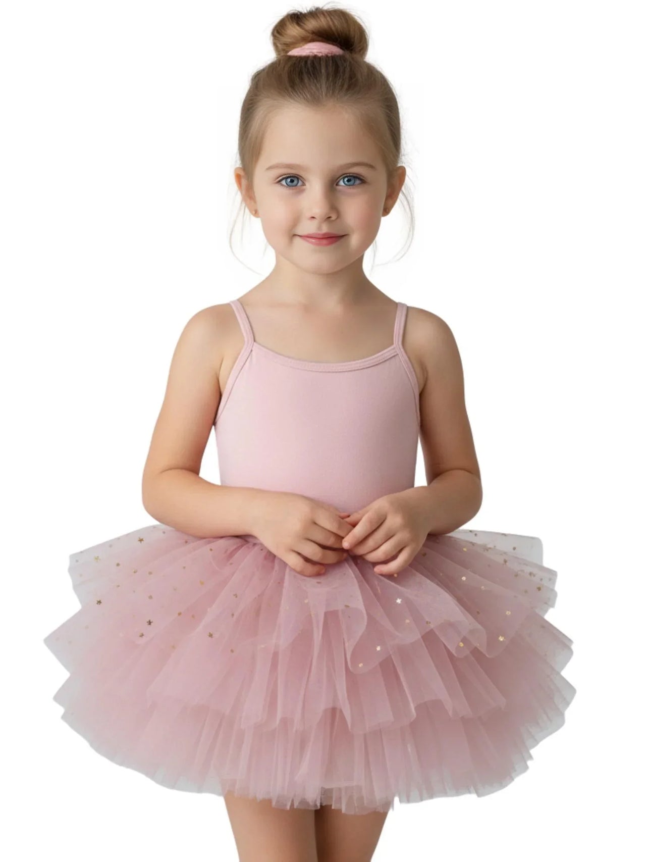 Young girl wearing a dark pink glitter ballet tutu dress with thin straps on a white background