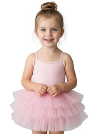 Thumbnail for Young girl wearing a bright pink ballet tutu dress with thin straps on a white background