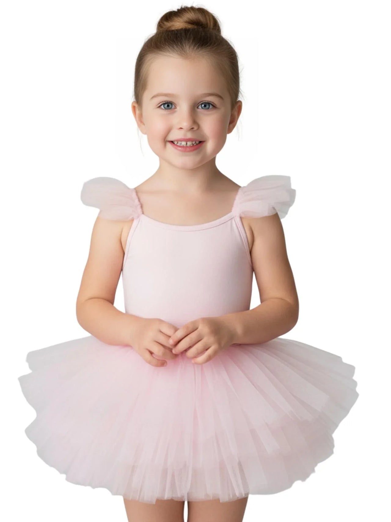 Young girl in a light pink ballet tutu dress with pom pom sleeves on a white background