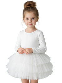 Thumbnail for Young girl wearing a white long sleeved ballet tutu dress against a white background