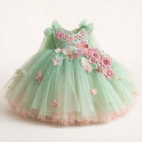 Thumbnail for Mint green dress with floral and butterfly details on a white background