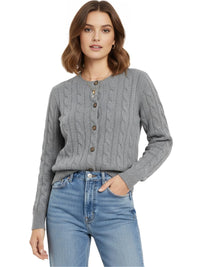 Thumbnail for Woman wearing a grey cable knit sweater and blue jeans on a white background