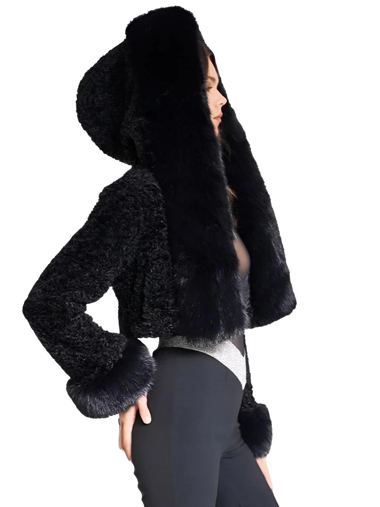 Black fur-lined hooded jacket worn by a person on a white background