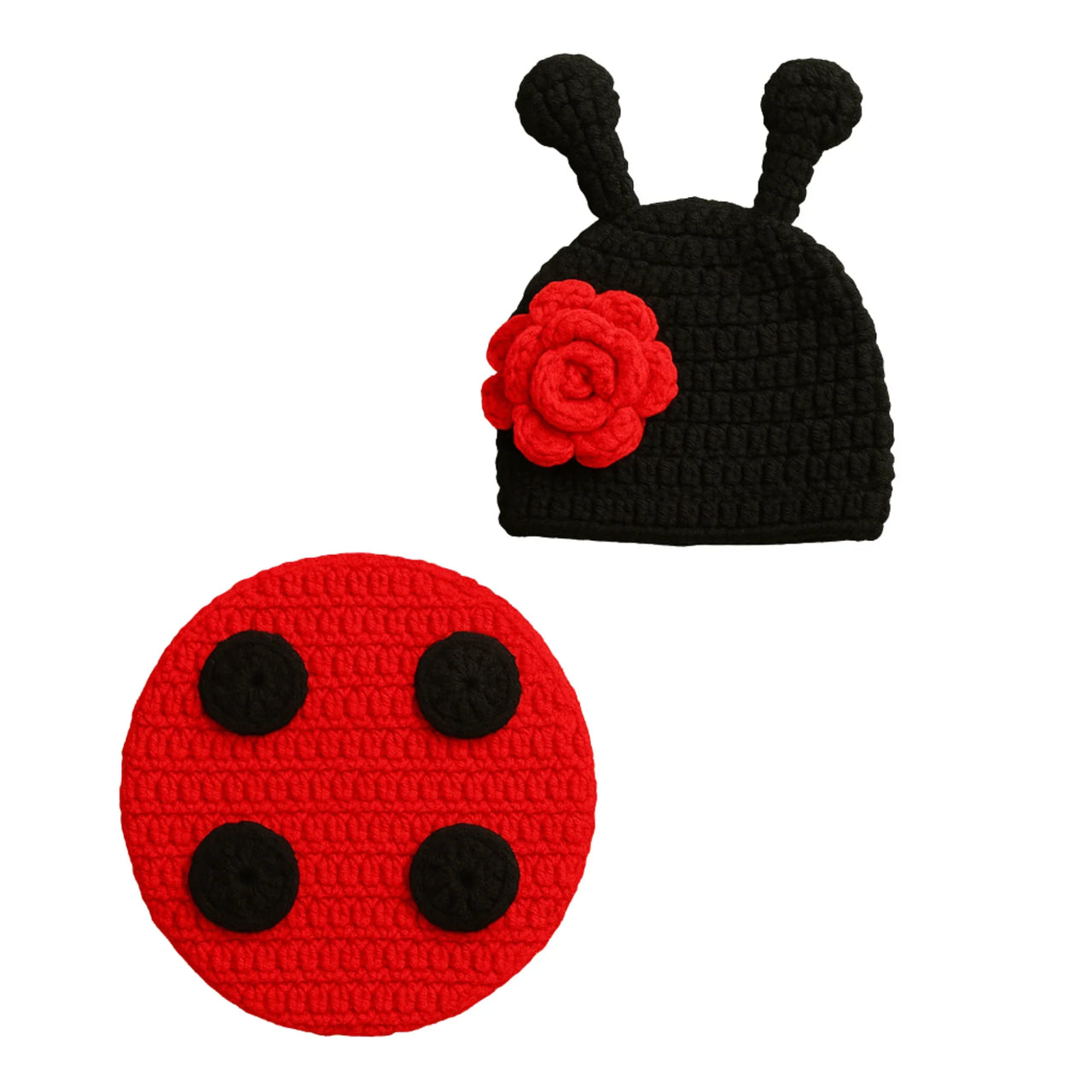 Black crocheted ladybug hat with red flower and matching red ladybug patch on a white background