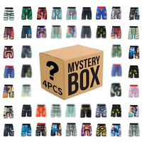 Thumbnail for Box of mystery men's boxers with colorful pairs displayed around it