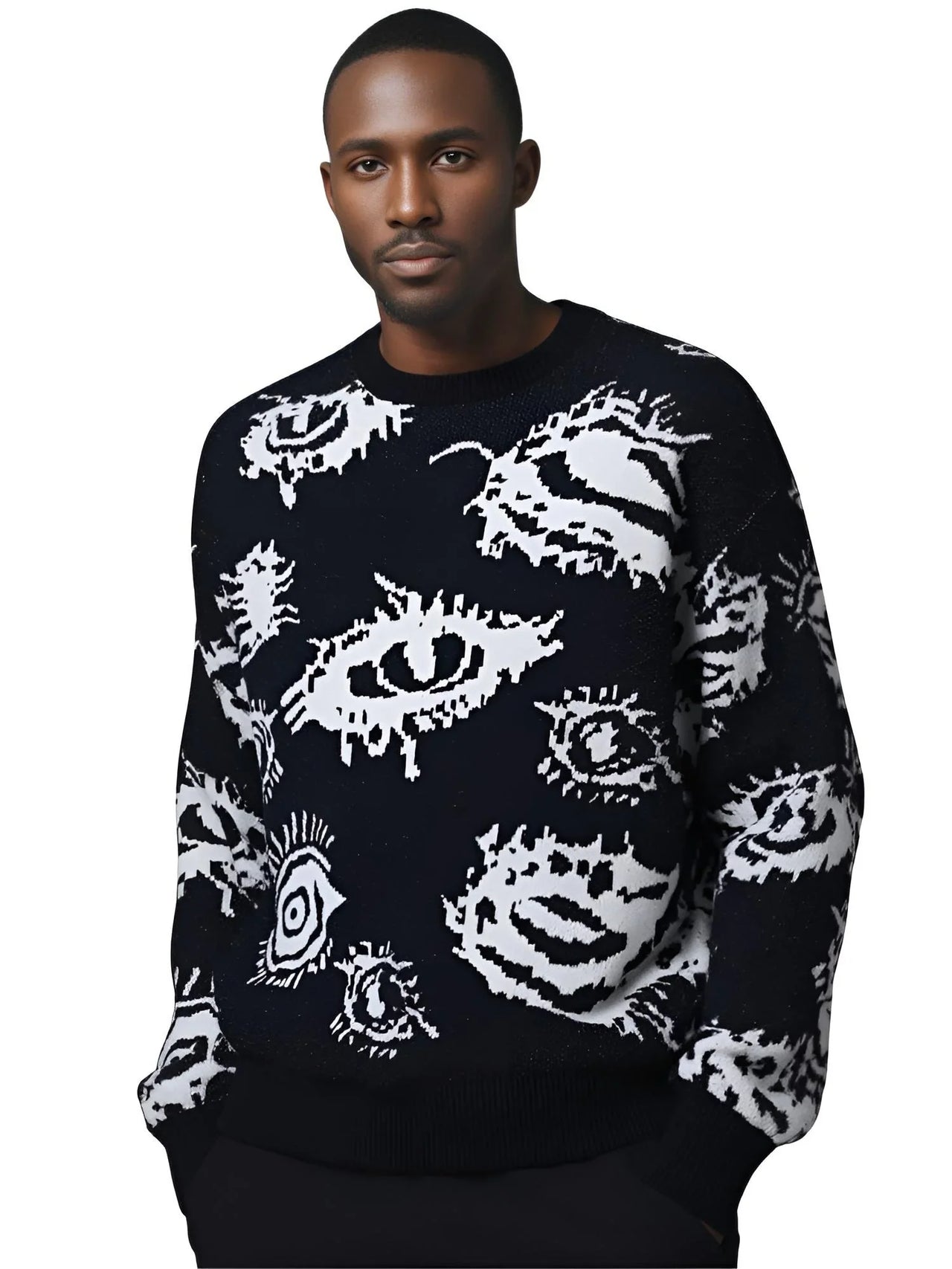 Man wearing a black sweater with white eye pattern on a white background