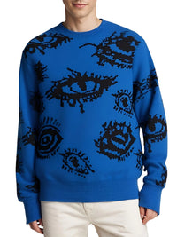 Thumbnail for Blue sweater with black eye patterns worn by a person on a white background