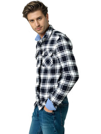 Thumbnail for Man wearing a black and white plaid shirt with blue jeans on a white background