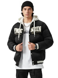 Thumbnail for Man wearing a black and white varsity jacket with visible branding on a white background