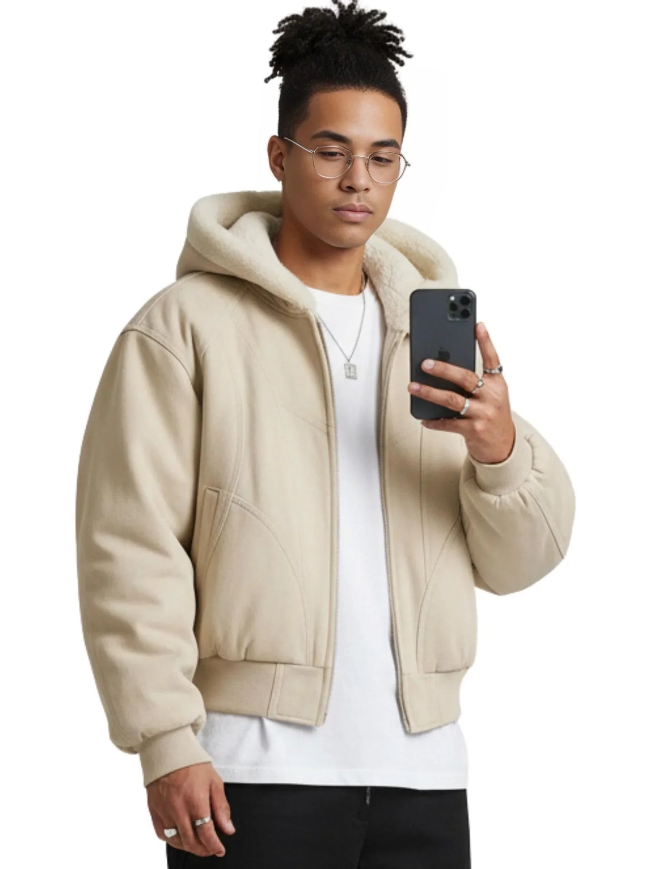 Man wearing a khaki canvas short jacket holding a phone on a white background