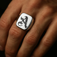 Thumbnail for Silver ring with the initial 'a' on a hand