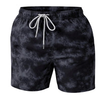 Thumbnail for Black tie-dye swim shorts with a drawstring on a white background