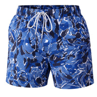 Thumbnail for Blue and black patterned swim shorts with a drawstring on a white background