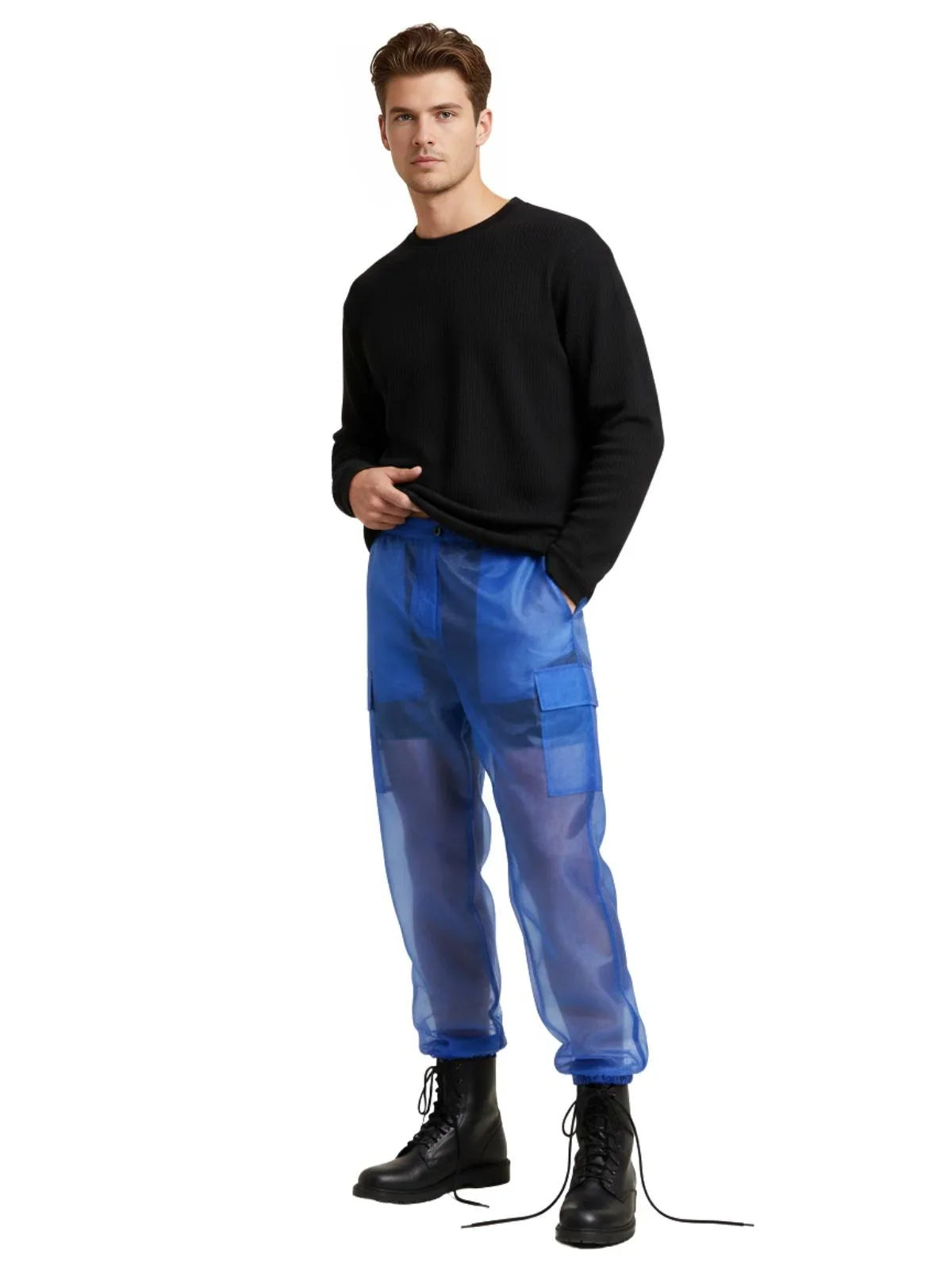 Man wearing a black sweater and blue see through pants on a white background