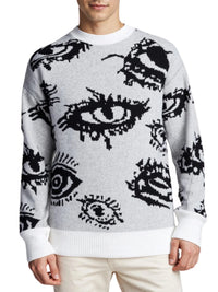 Thumbnail for White sweater with black eye pattern worn by a man.