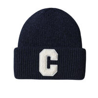 Thumbnail for Navy blue beanie with a white 'C' logo on a white background