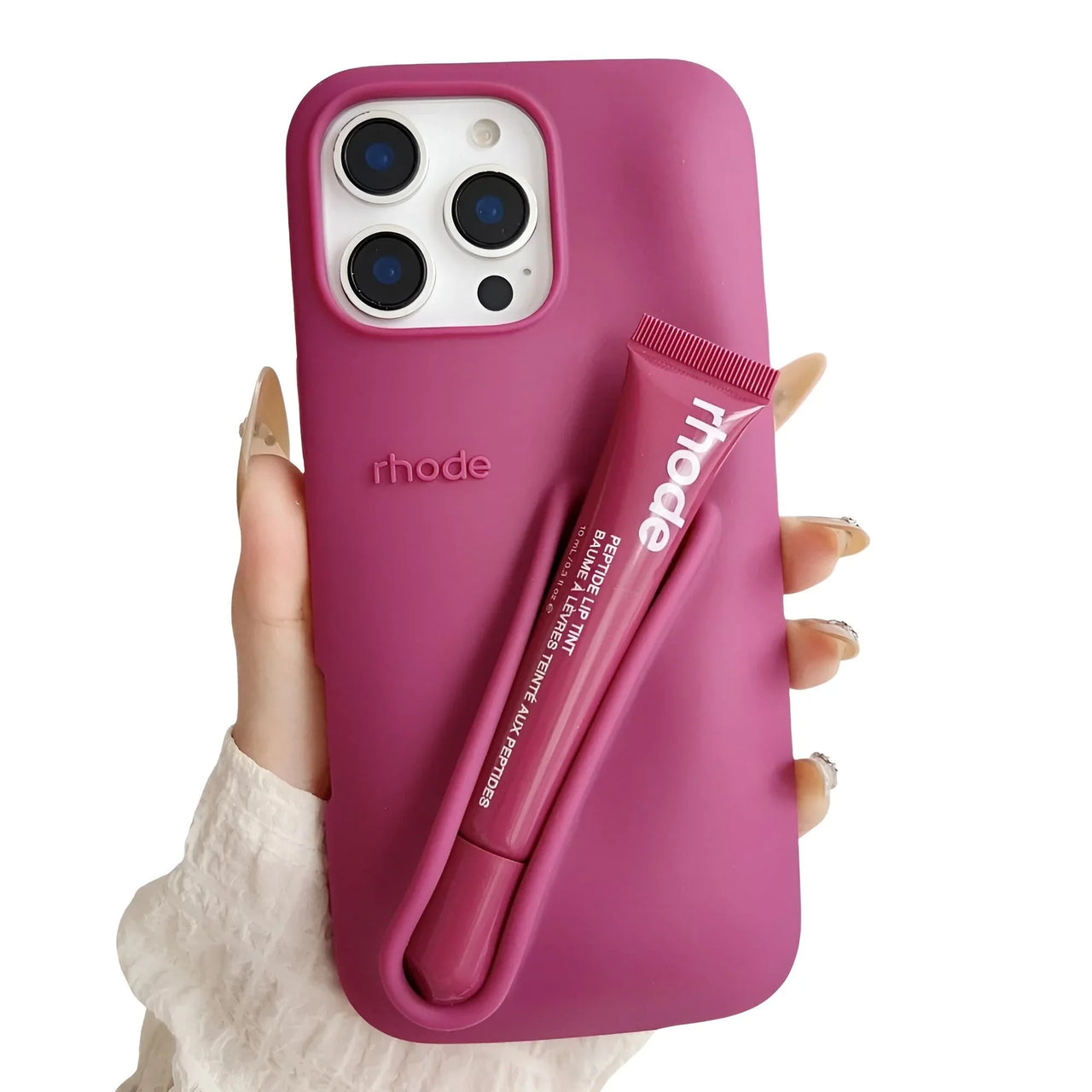 Pink phone case with a matching lip balm held by a hand on a white background