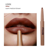 Thumbnail for Lipstick with 'rhode' branding applied to lips, showing color 'LEAN' described as warm medium brown.