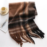 Thumbnail for Brown plaid scarf with fringes on a white surface