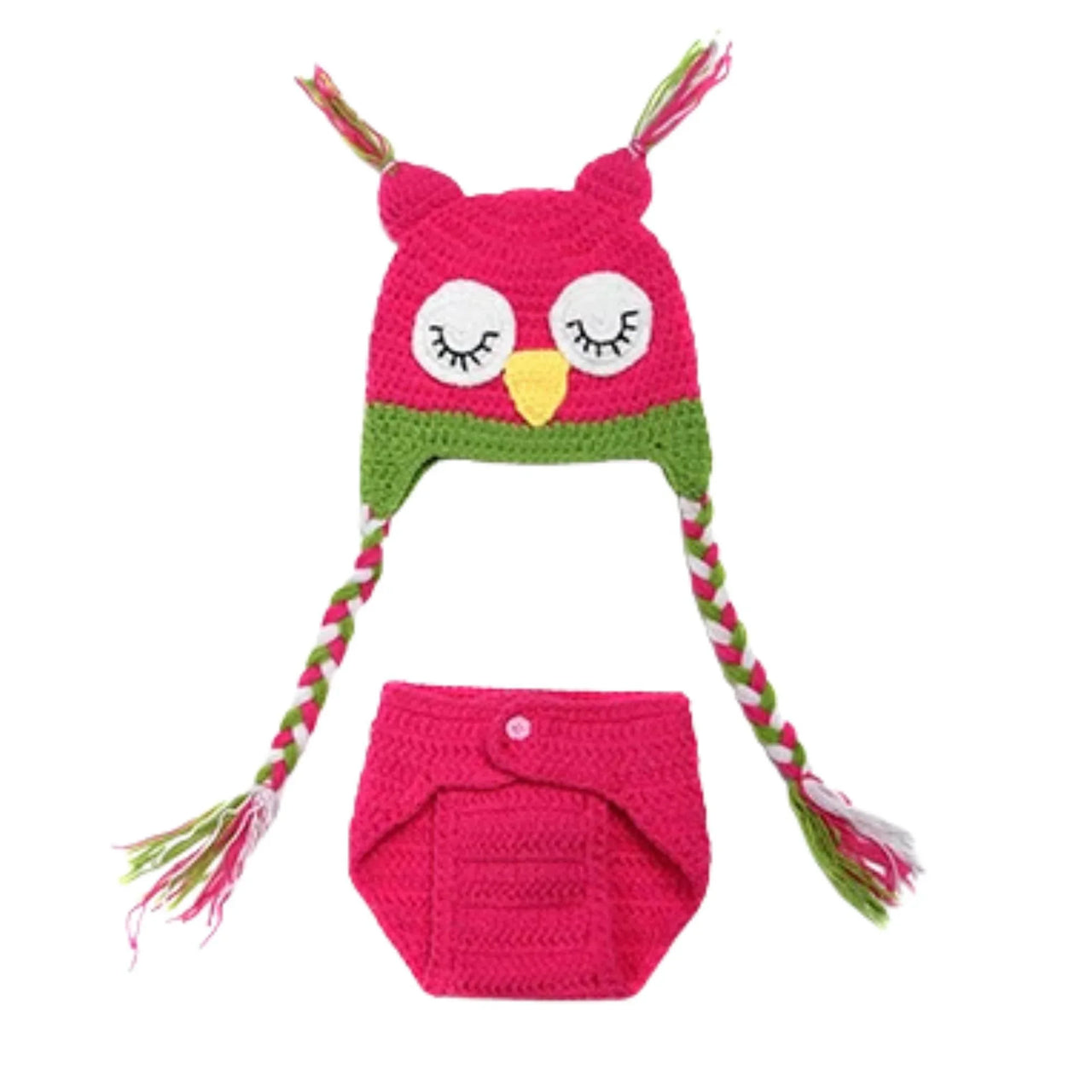 Crocheted owl hat and diaper set on a white background