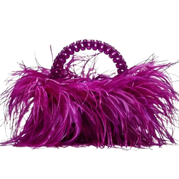 Unleash your inner fashionista with this stunning Pearl Bead Handle Bag, beautifully embellished with purple Ostrich Feathers. Shop at Drestiny today to enjoy free shipping and let us handle the taxes. Save up to 50% off on this irresistible deal!