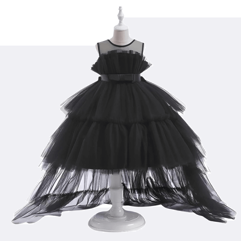 Shop the exquisite Puffy Tulle Girls Black Dress at Drestiny! Perfect for First Communion parties, this trailing dress is a must-have. Enjoy free shipping and let us cover the tax! Save up to 50% off!