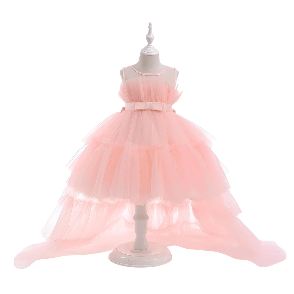 Shop the exquisite Puffy Tulle Girls Pink Dress at Drestiny! Perfect for First Communion parties, this trailing dress is a must-have. Enjoy free shipping and let us cover the tax! Save up to 50% off!
