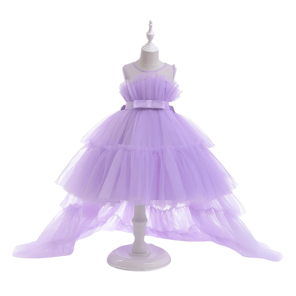 Shop the exquisite Puffy Tulle Girls Purple Dress at Drestiny! Perfect for First Communion parties, this trailing dress is a must-have. Enjoy free shipping and let us cover the tax! Save up to 50% off!