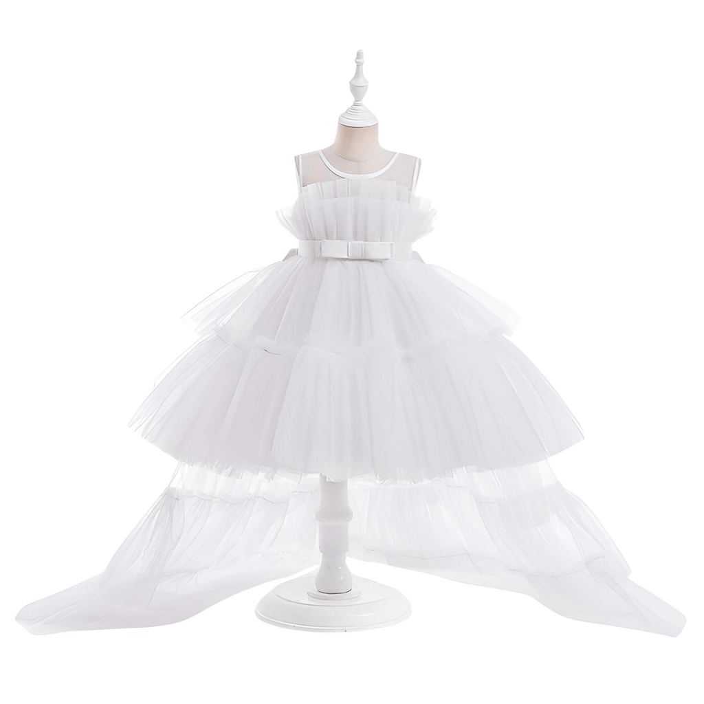 Shop the exquisite Puffy Tulle Girls White Dress at Drestiny! Perfect for First Communion parties, this trailing dress is a must-have. Enjoy free shipping and let us cover the tax! Save up to 50% off!