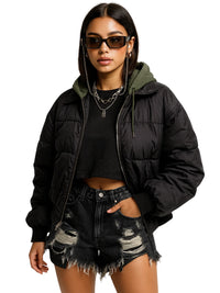 Thumbnail for Woman wearing a black puffer jacket, black crop top, and distressed black denim shorts on a white background