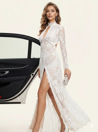 Thumbnail for Woman in a long sleeved white lace dress standing next to a white car on a white background