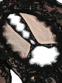 Thumbnail for Black lace fabric with beige lining on a white background
