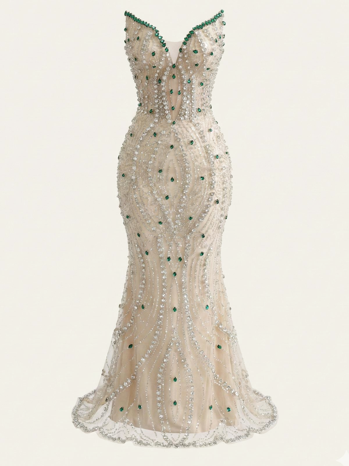 Elegant strapless evening gown with intricate beading and green gem stones on a white background