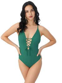 Thumbnail for Woman wearing a green swimsuit with a white background