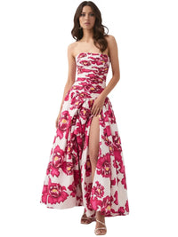 Thumbnail for Woman wearing a red floral strapless long bubble dress with a high slit on a white background