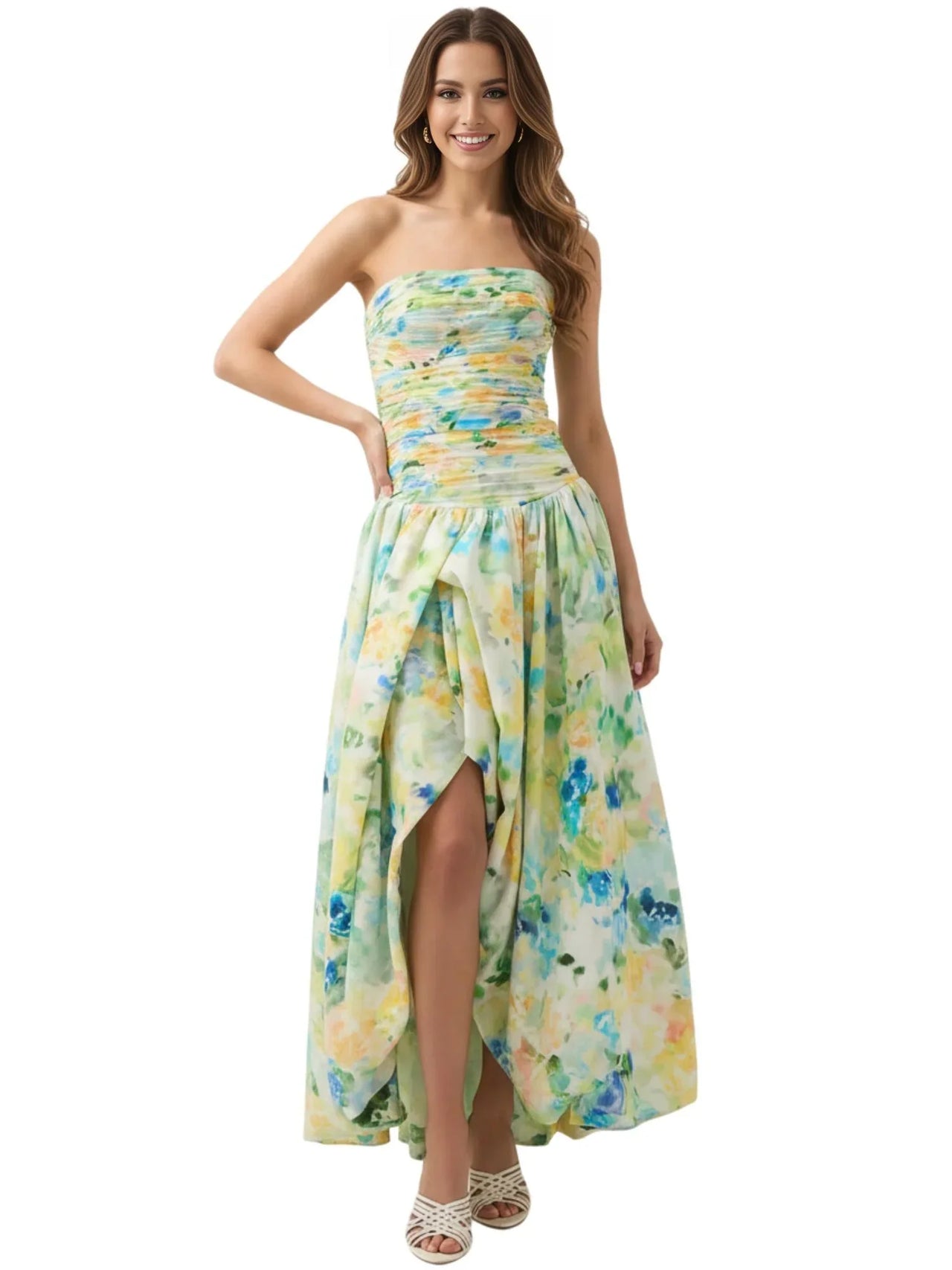 Woman wearing a green-blue floral strapless long bubble dress on a white background